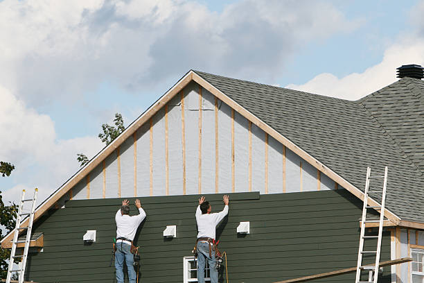 Professional Siding Contractor technician working in Rootstown, OH